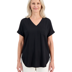 Model wearing the black loose V neck top, front standing