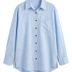 Blue oversized button-down shirt with chest pocket, front view on white