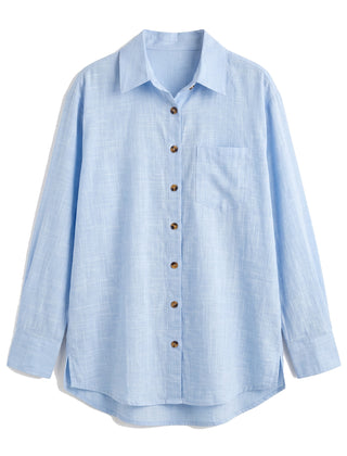 Blue oversized button-down shirt with chest pocket, front view on white