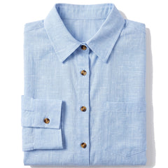 Close-up of the patch chest pocket, brown buttons and collar
