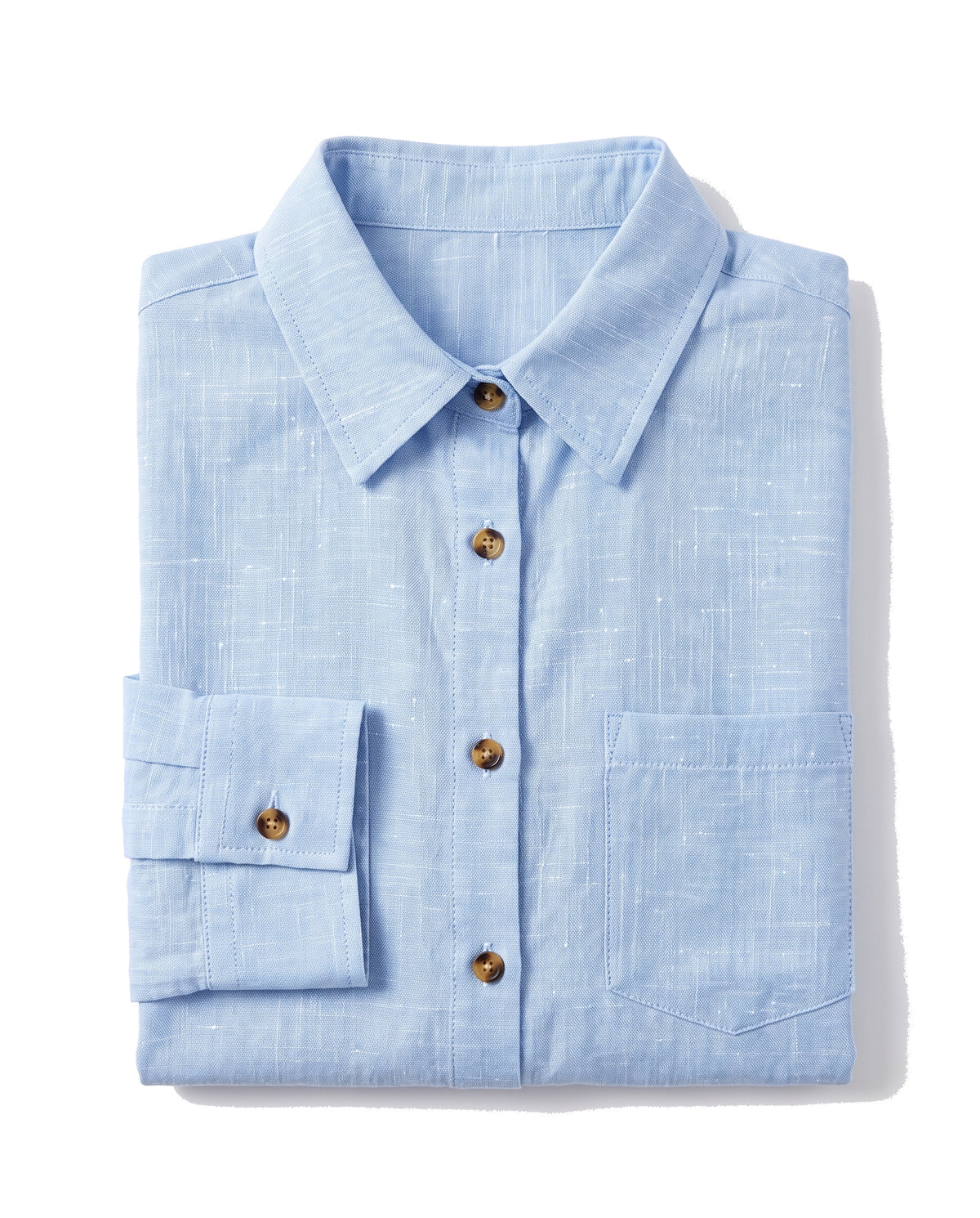 Close-up of the patch chest pocket, brown buttons and collar