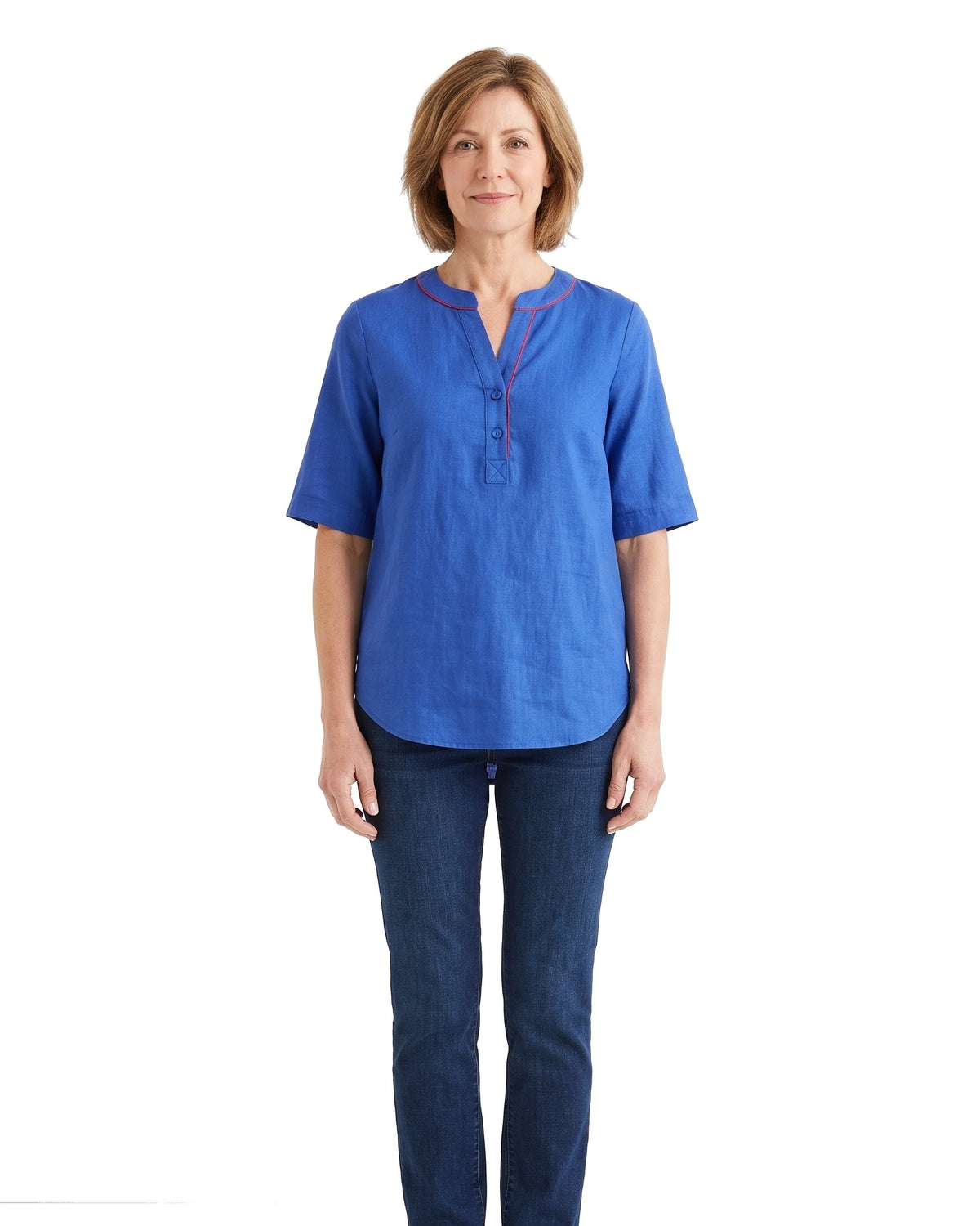 Woman wearing the blue tunic top with jeans, front standing pose